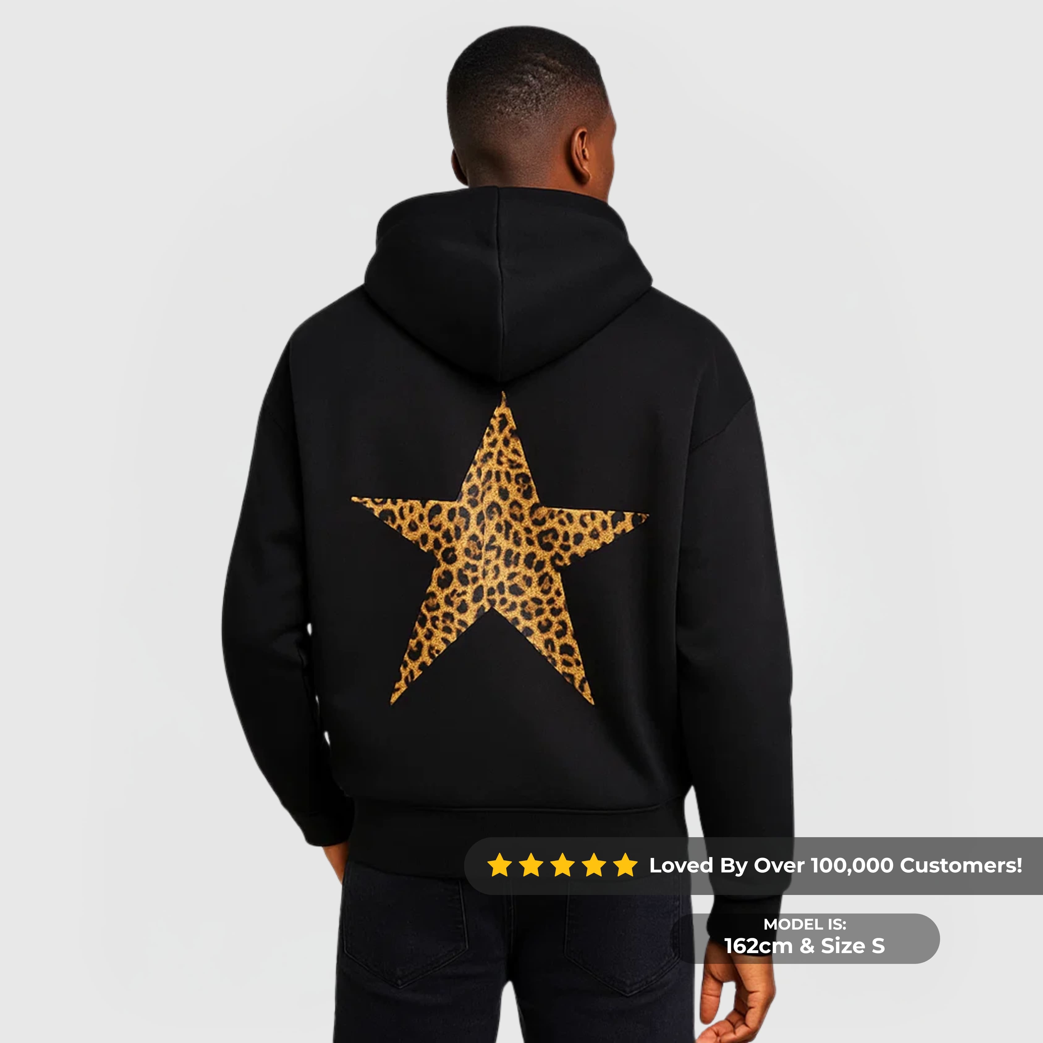 Star Hoodie – Black with a large leopard print star on the back, worn by a male model with hood up.