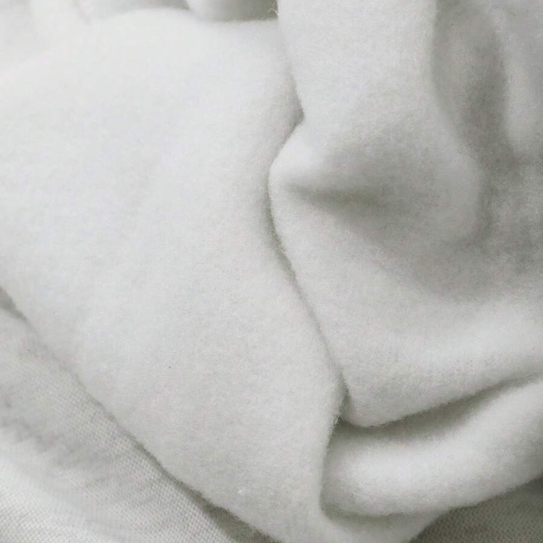 Close-up of soft brushed fleece interior fabric of the Oversized Essential Hoodie – Grey showing texture and warmth.