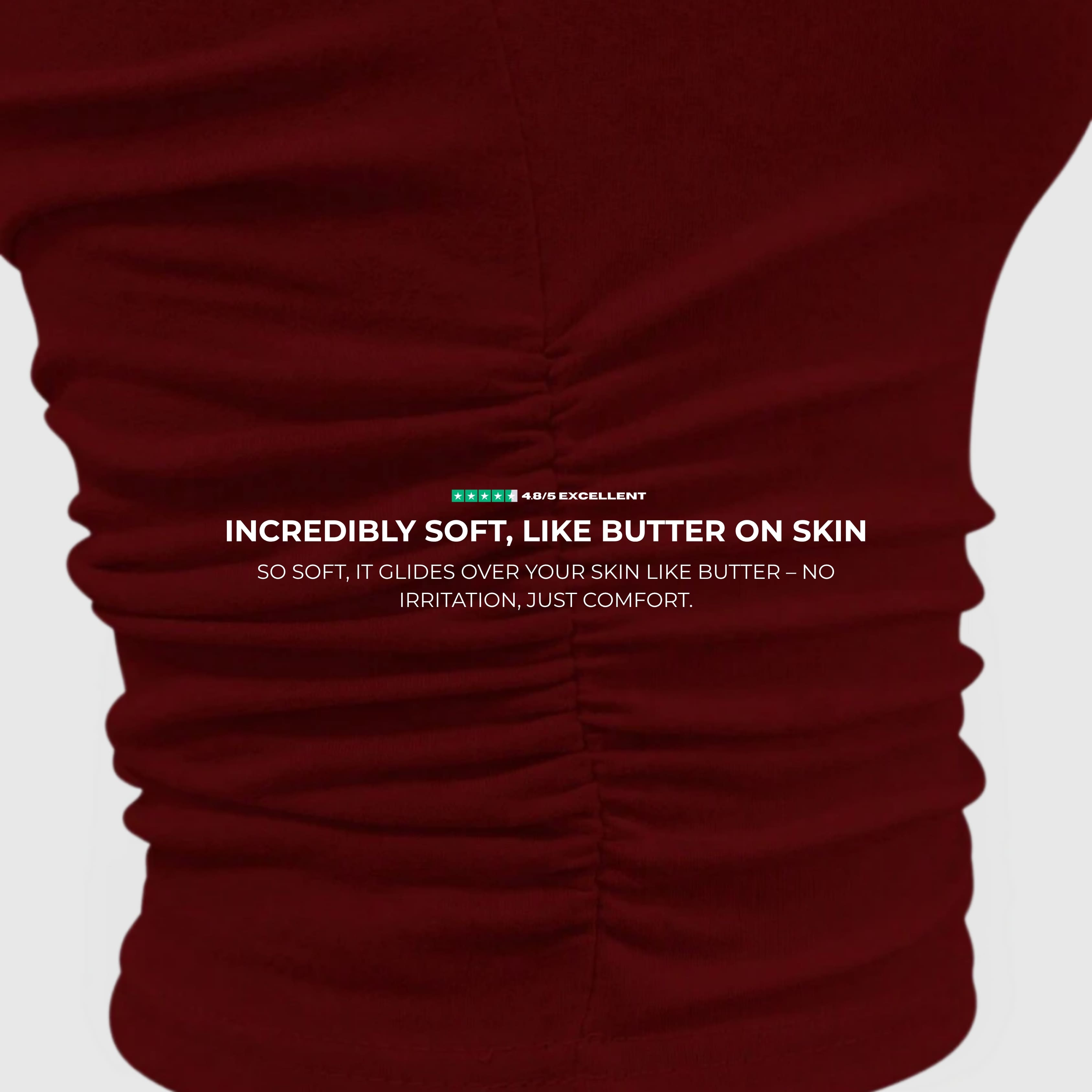 Close-up of ruched fabric detail on the One-Shoulder Ruched Top – Burgundy, highlighting its soft, stretchy texture.