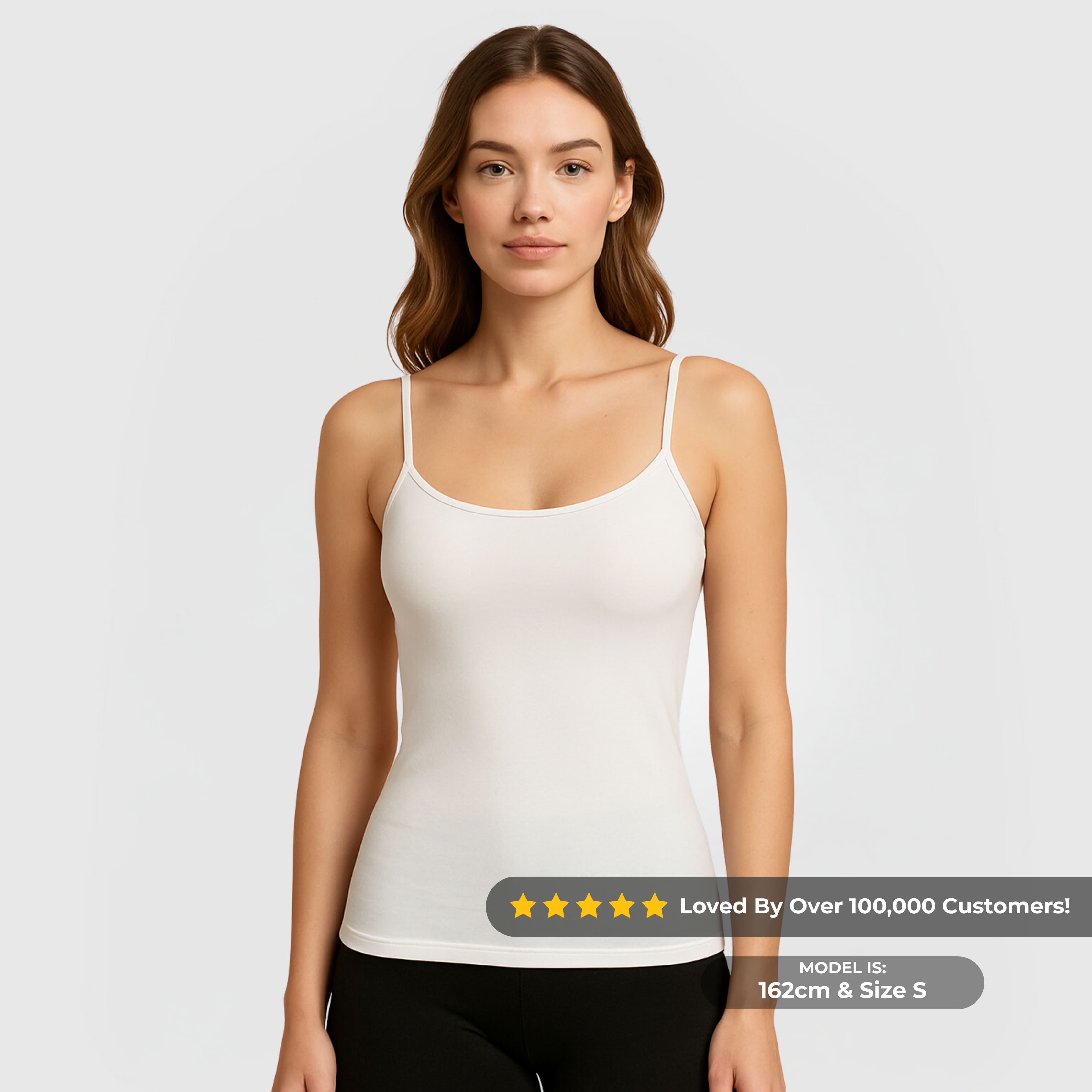 Everyday Cami 3-Pack - WBG showing a woman wearing a white thin strap camisole top with a scoop neckline.