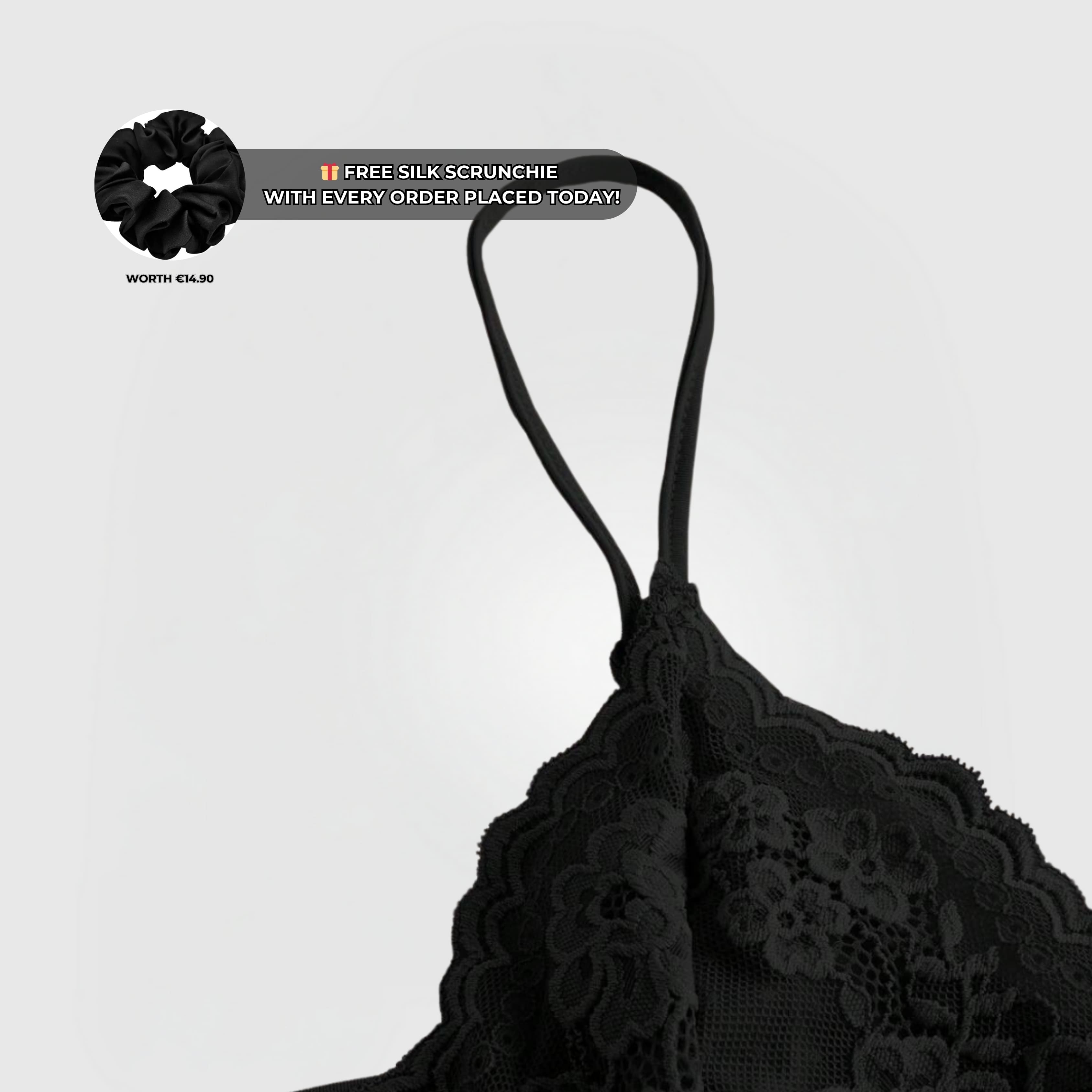 Soft Lace Cami - Black featuring delicate lace trim, adjustable straps, and a flattering ruched front detail.