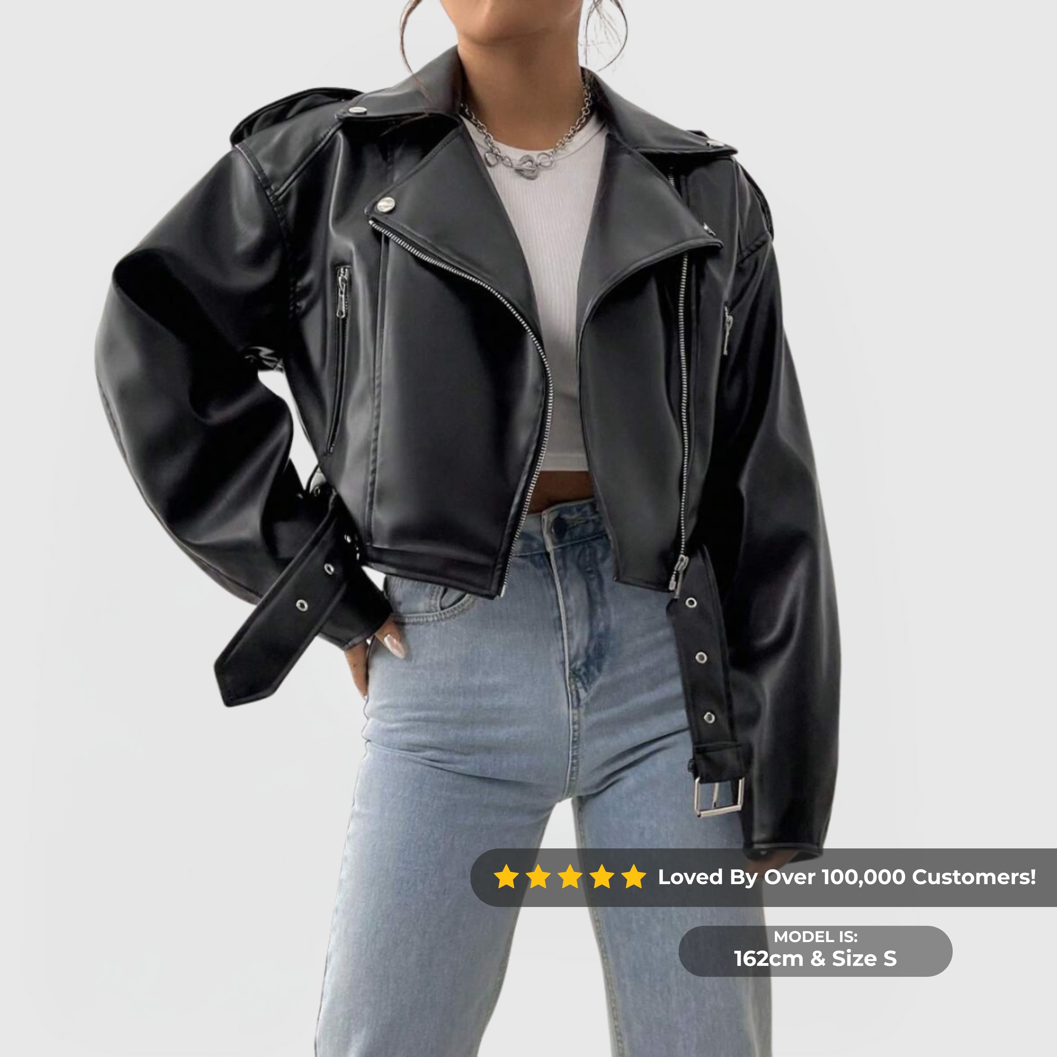 Cropped Biker Jacket – Black in faux leather with zipper front, lapel collar, and adjustable toggle hem on model.