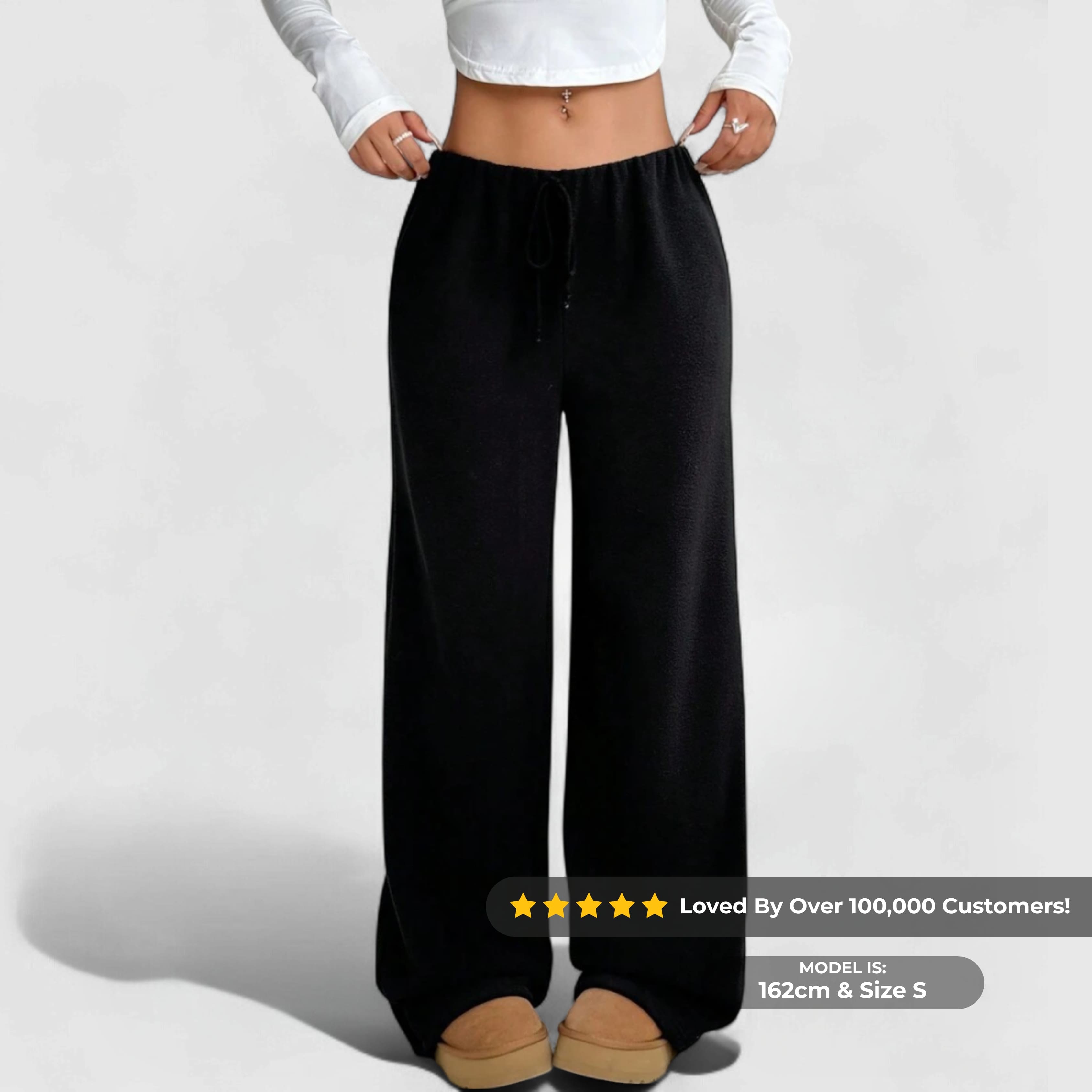 Cozy Fleece Joggers - Black worn by model, featuring relaxed fit, elastic waistband, and soft fleece for all-day comfort.